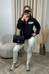 Sporty black printed 3/4 sweater and legging set