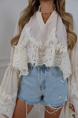 JENNY LIGHT WASH RIPPED DENIM SHORTS