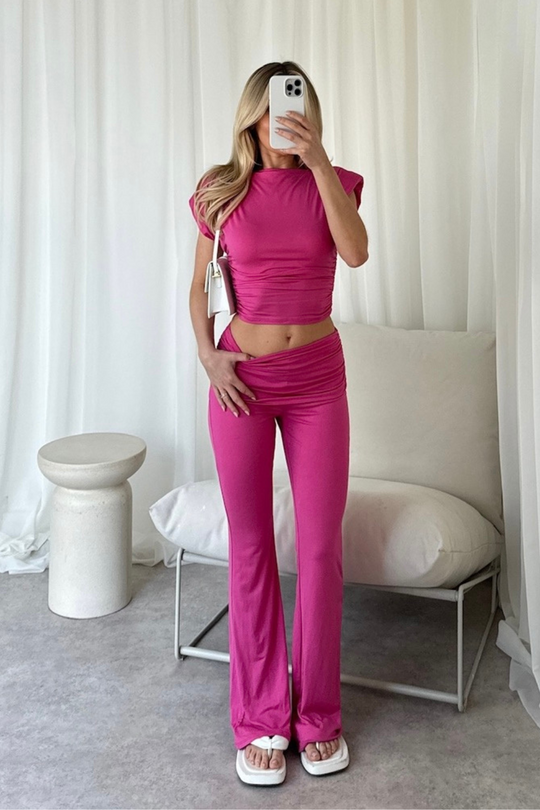 Miley hot pink shoulder pad top and trouser co-ord