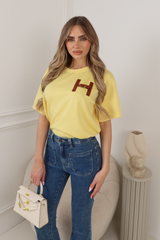 MIA LEMON  T-SHIRT WITH FAUX LEATHER H BUCKLE