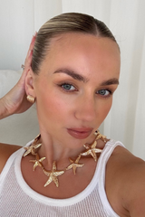 Freya gold starfish earrings & necklace