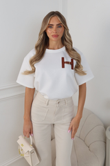 MIA CREAM T-SHIRT WITH FAUX LEATHER H BUCKLE