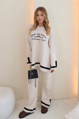 Apres ski beige embroidered knitted jumper and trousers