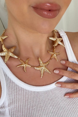 Freya gold starfish earrings & necklace