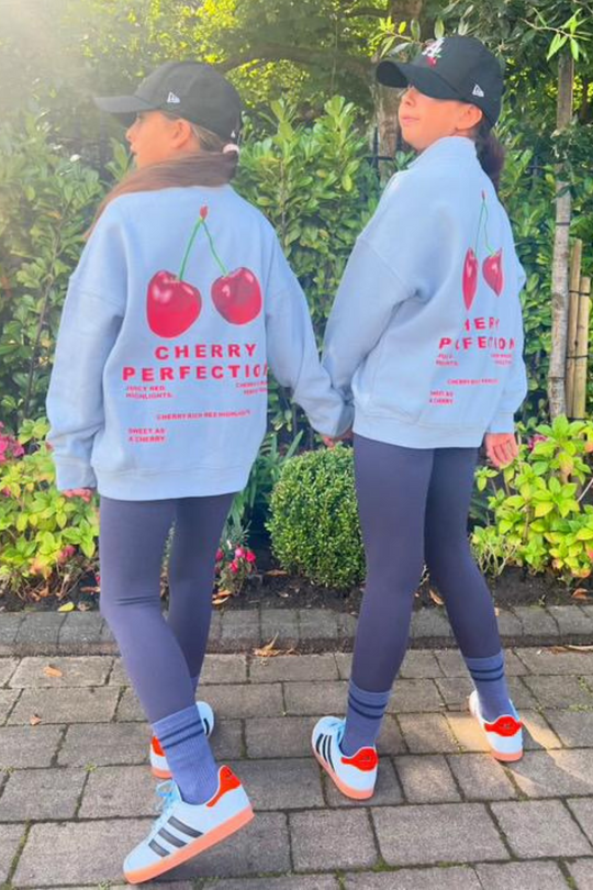 Mini cherry perfection baby blue printed 3/4 zip sweater