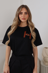 MIA BLACK T-SHIRT WITH FAUX LEATHER H BUCKLE