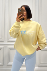 LOS ANGELES RUNNING CLUB BUTTER YELLOW PRINTED SWEATER