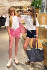 Mini run club white & pink printed t-shirt and mini shorts