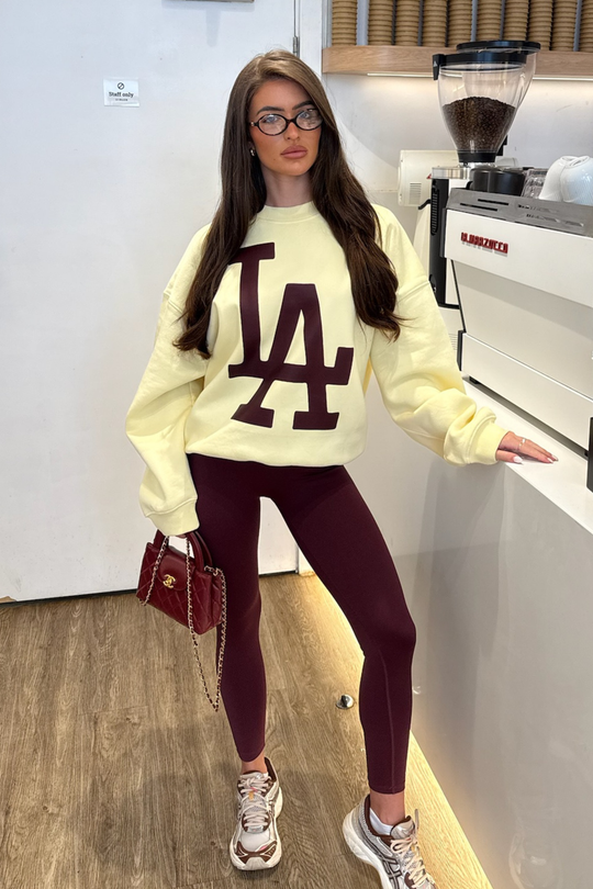 LA ESSENTIAL BUTTER YELLOW PRINTED SWEATER