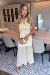 Sandy lemon knit waistcoat & pleated sheer maxi skirt