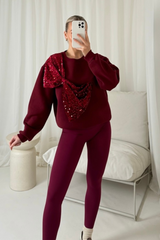 Darla burgundy bow sequin sweater