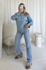 Wellness club blue embroidered sweater