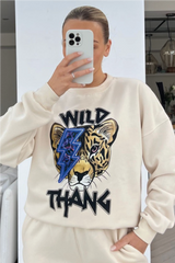 Wild thang blue printed ecru sweater