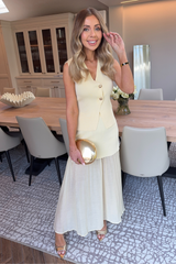 Sandy lemon knit waistcoat & pleated sheer maxi skirt