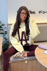 LA ESSENTIAL BUTTER YELLOW PRINTED SWEATER