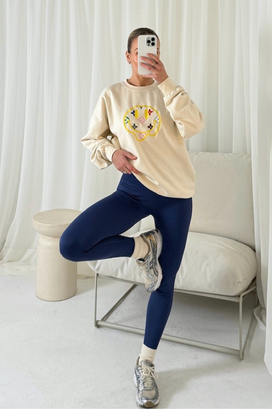 Smiley pattern ecru embroidered sweater and legging set