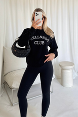 Wellness club black embroidered sweater