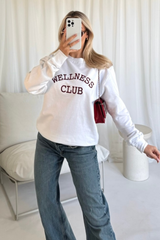 Wellness club white embroidered sweater