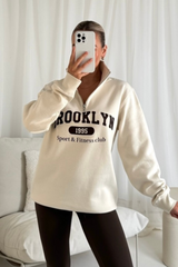 Brooklyn ecru printed 3/4 zip sweater