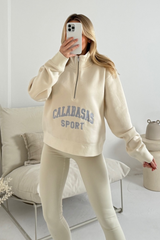 Calabasas ecru embroidered cropped 1/2 zip sweater