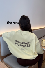 RUNNING & WELLNESS BUTTER YELLOW PRINTED SWEATER