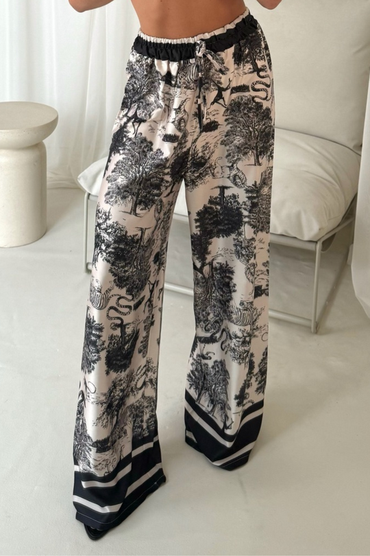 Daniella black jungle satin trousers