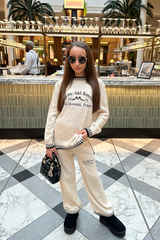 Mini apres ski cream knitted jumper and trousers