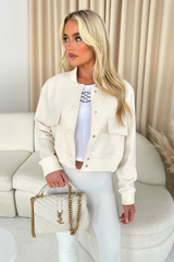 Fallon cream cropped long sleeve bomber jacket