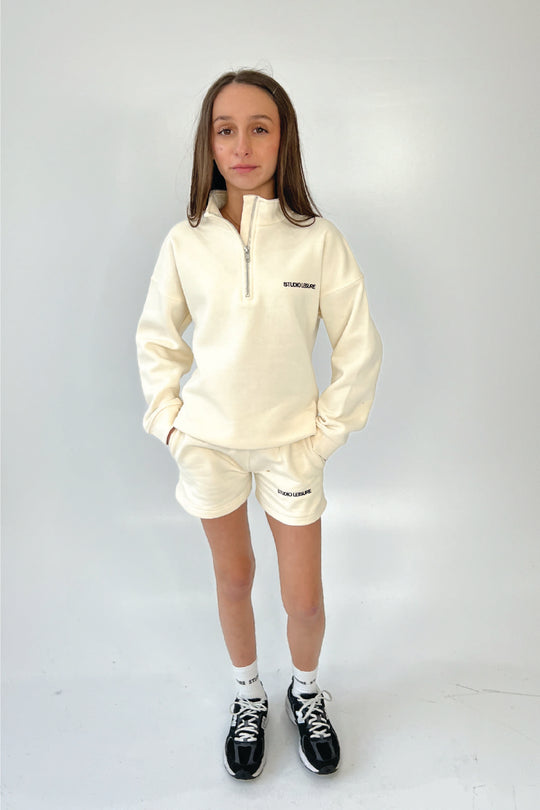 Mini studio leisure essential ecru embroidered 3/4 zip sweater