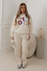 Studio multi colour printed ivory sweater & straight leg jogger set