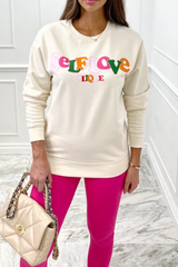 self love clique cream round neck sweater
