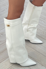 Kimmy white knee high fold over heel boots styled with a white blazer