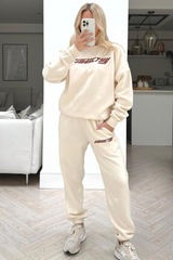Sporty & Wealthy ecru embroidered sweater loungewear set