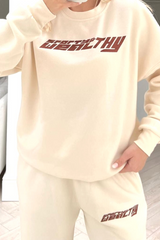 Sporty & Wealthy ecru embroidered sweater loungewear set