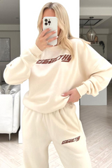 Sporty & Wealthy ecru embroidered sweater loungewear set