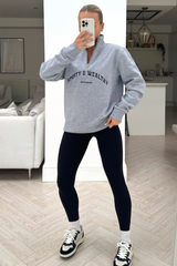 Sporty or whatever grey embroidered 1/4 zip sweater