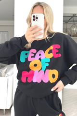 Peace of mind black printed sweater