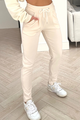 Naomi cream tailored fit drawstring trousers
