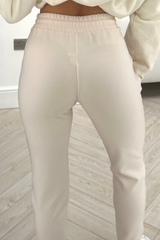 Naomi cream tailored fit drawstring trousers