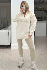 french riviera ecru embroidered 1/4 zip sweater