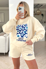 Stay Protected Ecru Printed sweater short loungewear set
